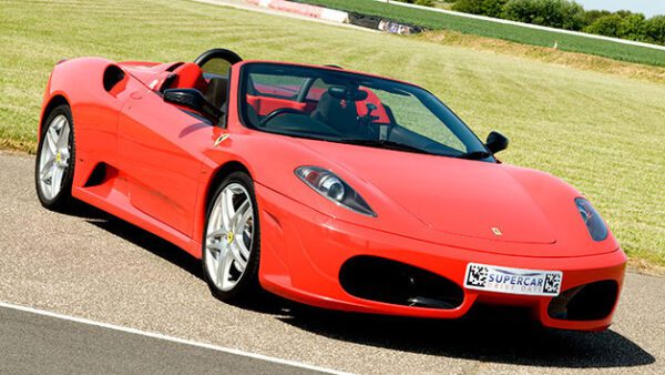 Shop the Exhilarating Four Supercar Driving Experience with High-Speed Passenger Ride - Available All Week