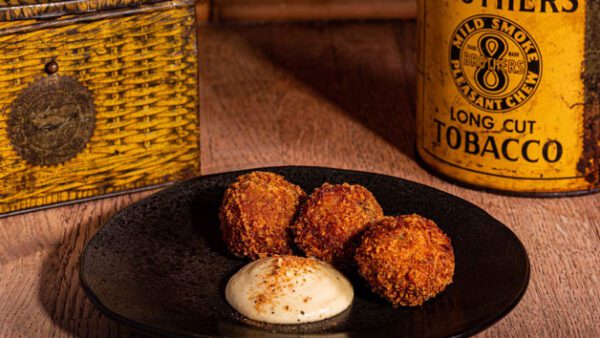 Shop the Exclusive Dining Experience: Gourmet Two-Course Meal with Drinks for Two at Red Dog Saloon - Image 5