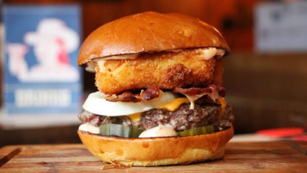 Shop the Exclusive Dining Experience: Gourmet Two-Course Meal with Drinks for Two at Red Dog Saloon - Image 2