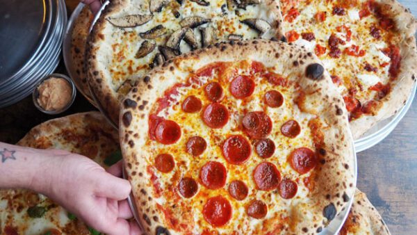 Shop the Unlimited Pizza Experience at Cowabunga Pizza for Couples - Image 2