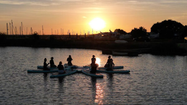 Shop Our Exclusive Duo Stand Up Paddleboard Yoga Experience - Image 5