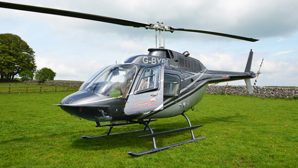 Shop the Exquisite 6-Mile Helicopter Tour Experience over Blue Skies with Complimentary Champagne for One